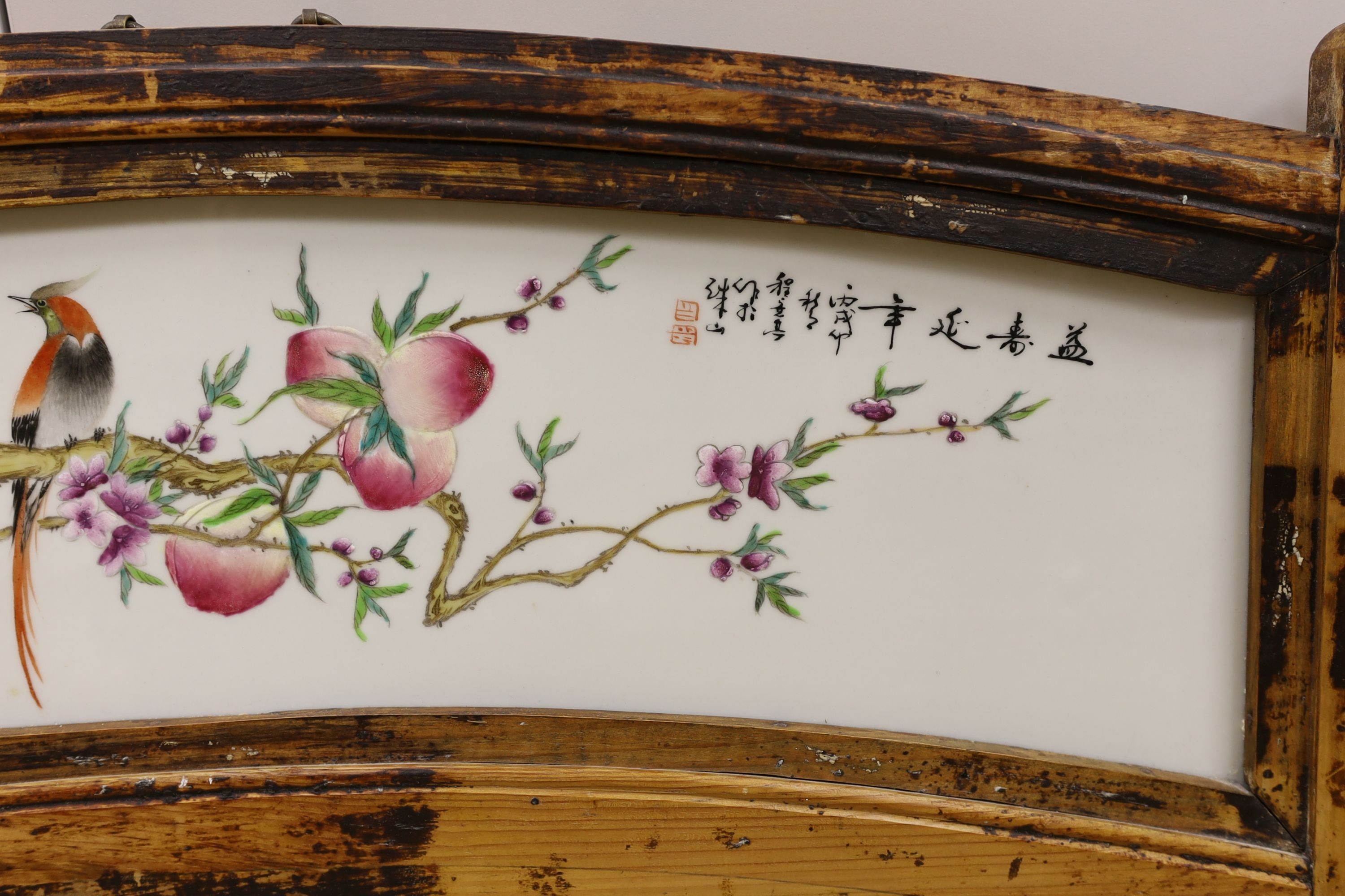 A 20th century Chinese framed porcelain panel, frame 79 cm wide